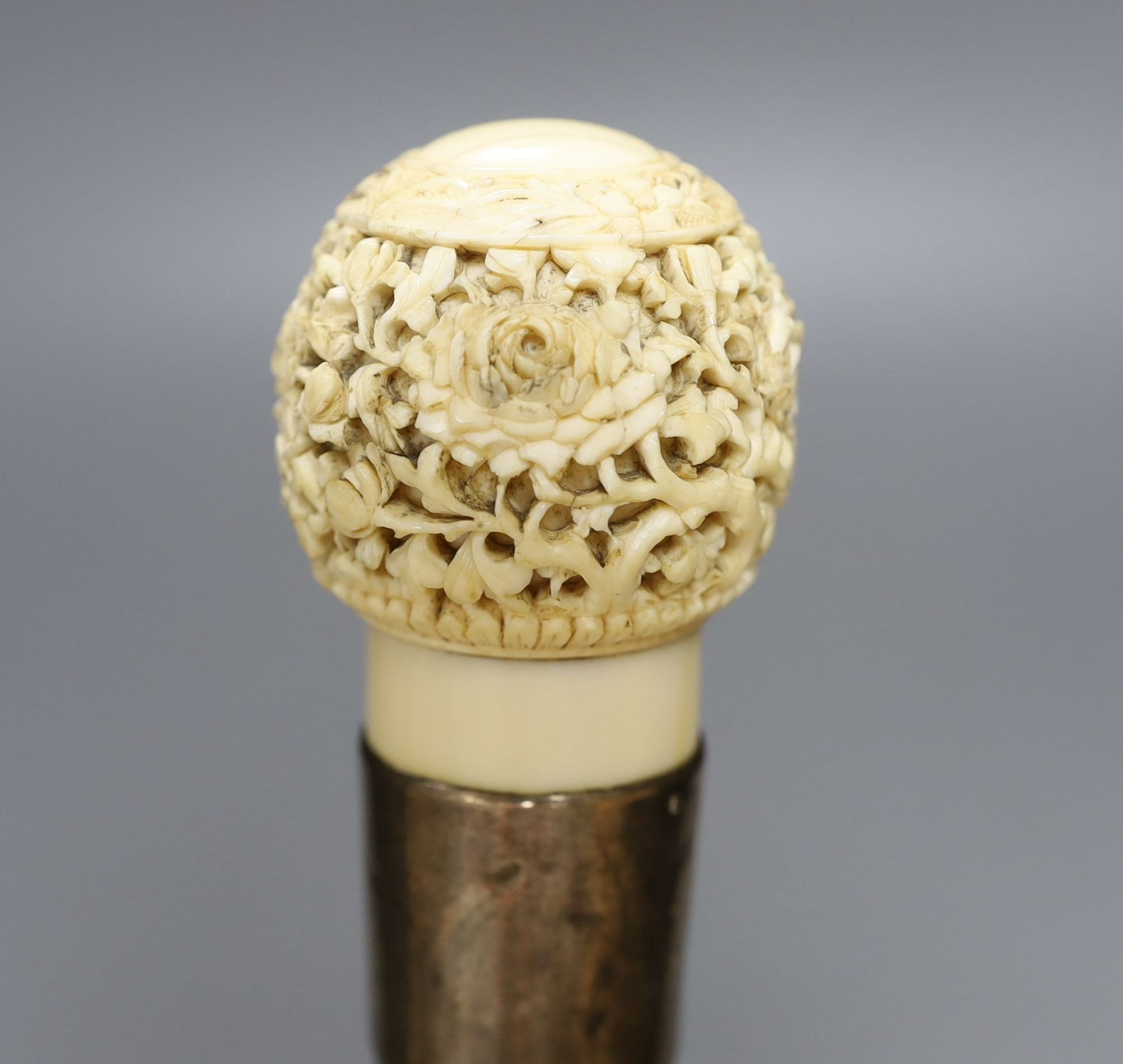 A 19th century carved Cantonese ivory top walking cane - 93cm high